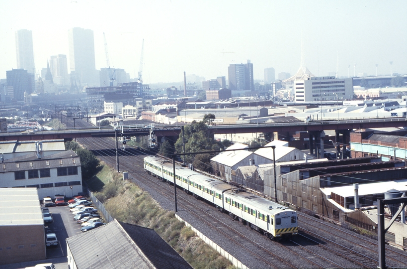 115962: Port Melbourne Line at Clarendon Street Down Suburban 4-car Rebuilt Harris 903 M leading