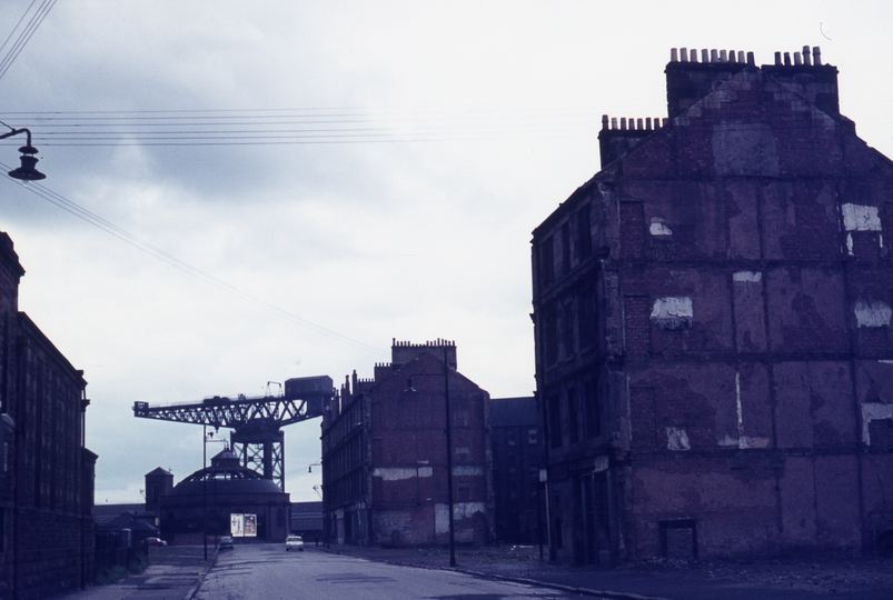 401417: Glasgow Scotland Govan Street scene Cupola over entrance to Clyde Pedestrian Tunnel at end of street